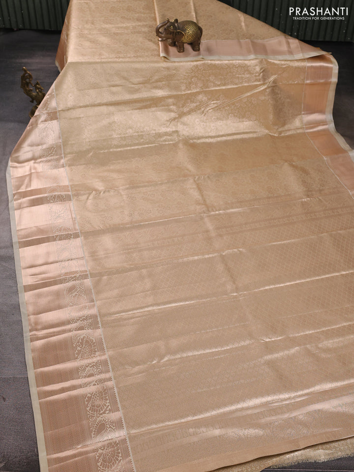 Bangalori tissue silk saree cream with allover zari woven brocade weaves and long zari woven border