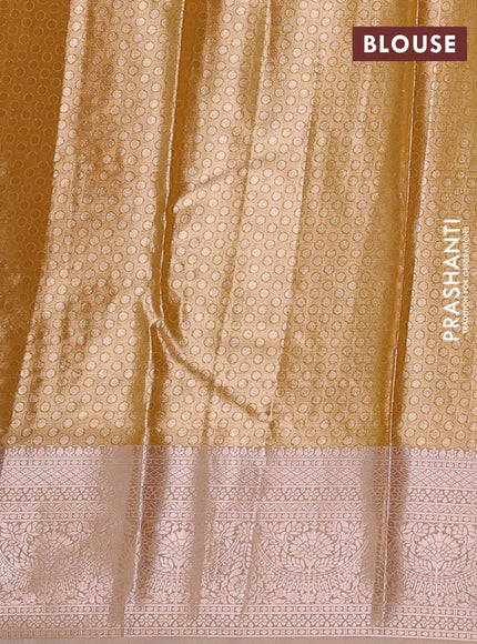 Bangalori tissue silk saree mustard yellow and pale orange with allover zari woven brocade weaves and zari woven border