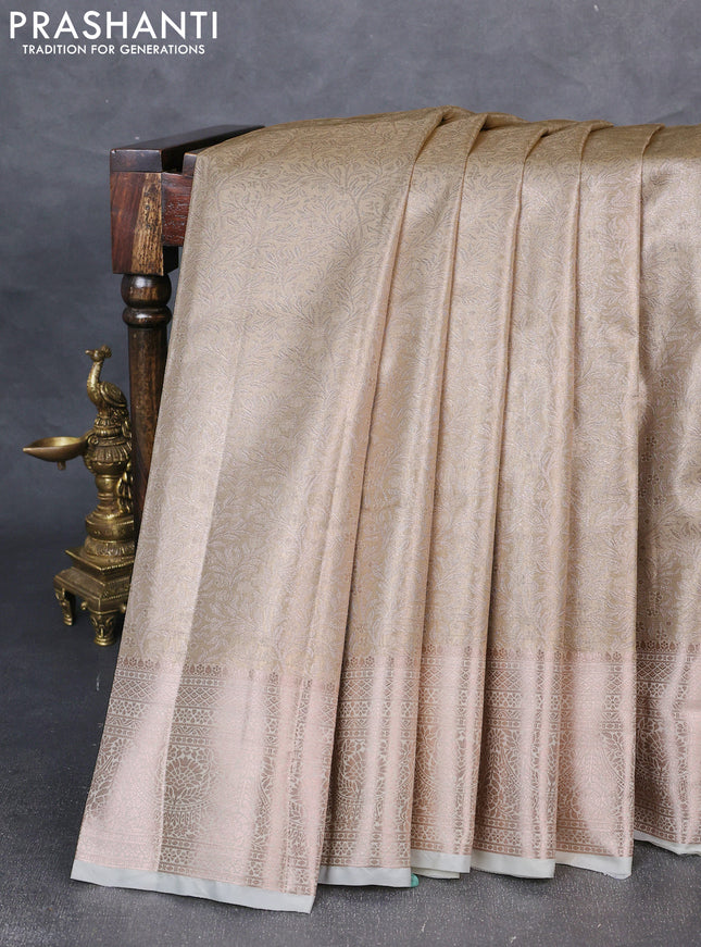 Bangalori tissue silk saree cream with allover zari woven brocade weaves and zari woven border