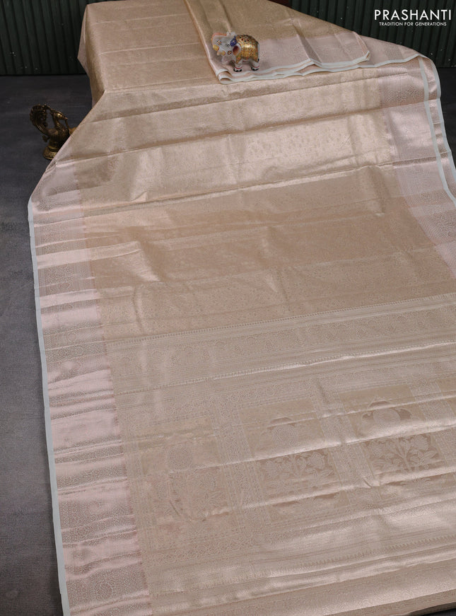 Bangalori tissue silk saree cream with allover zari woven brocade weaves and zari woven border
