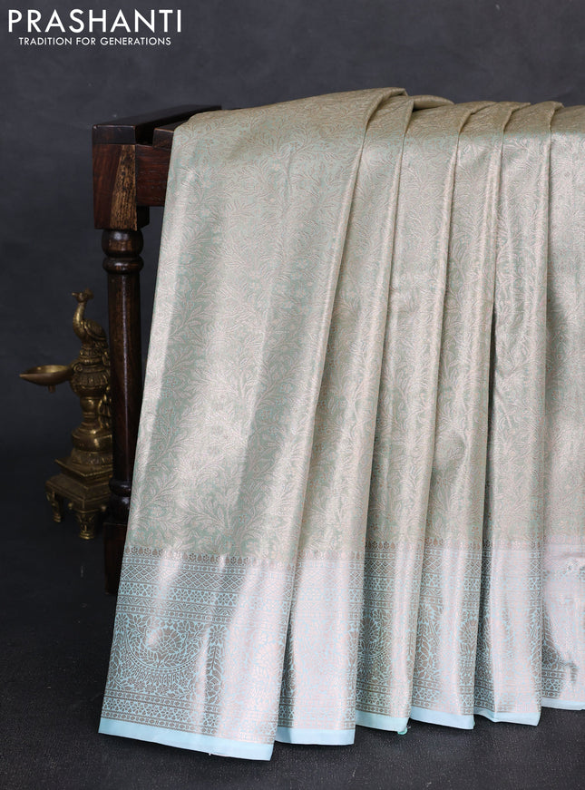 Bangalori tissue silk saree teal blue with allover zari woven brocade weaves and zari woven border