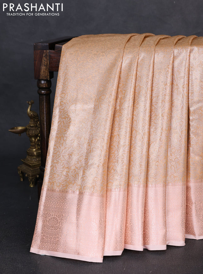 Bangalori tissue silk saree peach orange and peach shade with allover zari woven brocade weaves and zari woven border