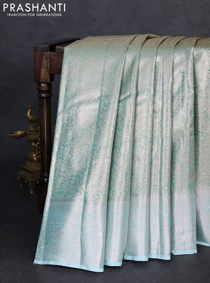 Bangalori tissue silk saree teal blue with allover zari woven brocade weaves and zari woven border