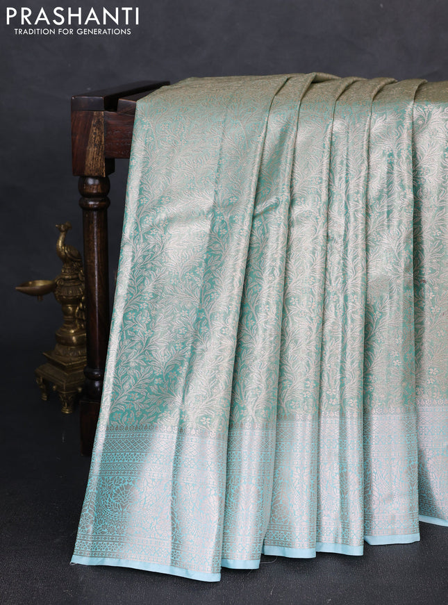 Bangalori tissue silk saree teal blue with allover zari woven brocade weaves and zari woven border