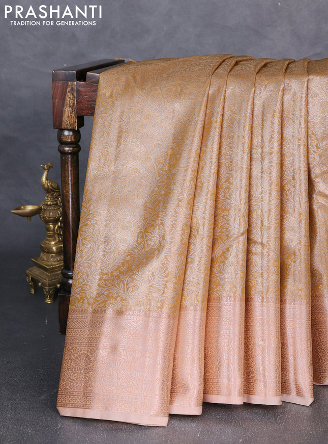 Bangalori tissue silk saree pale orange with allover zari woven brocade weaves and zari woven border
