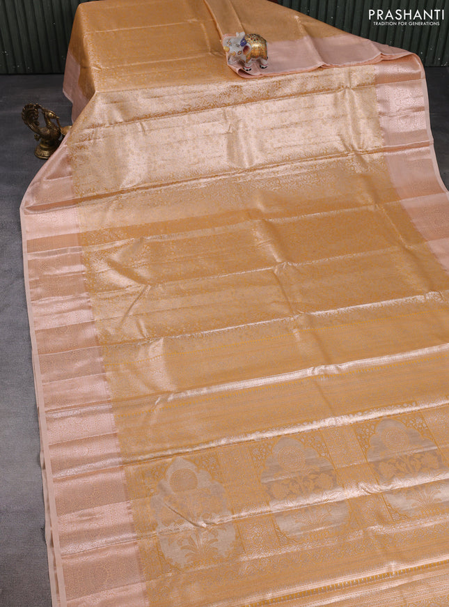 Bangalori tissue silk saree pale orange with allover zari woven brocade weaves and zari woven border