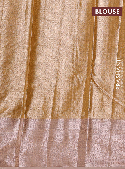 Bangalori tissue silk saree pale orange with allover zari woven brocade weaves and zari woven border