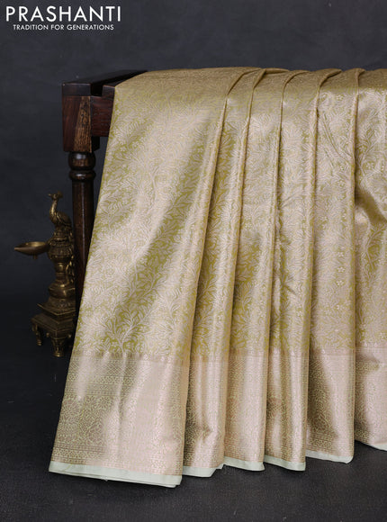 Bangalori tissue silk saree pista green with allover zari woven brocade weaves and zari woven border
