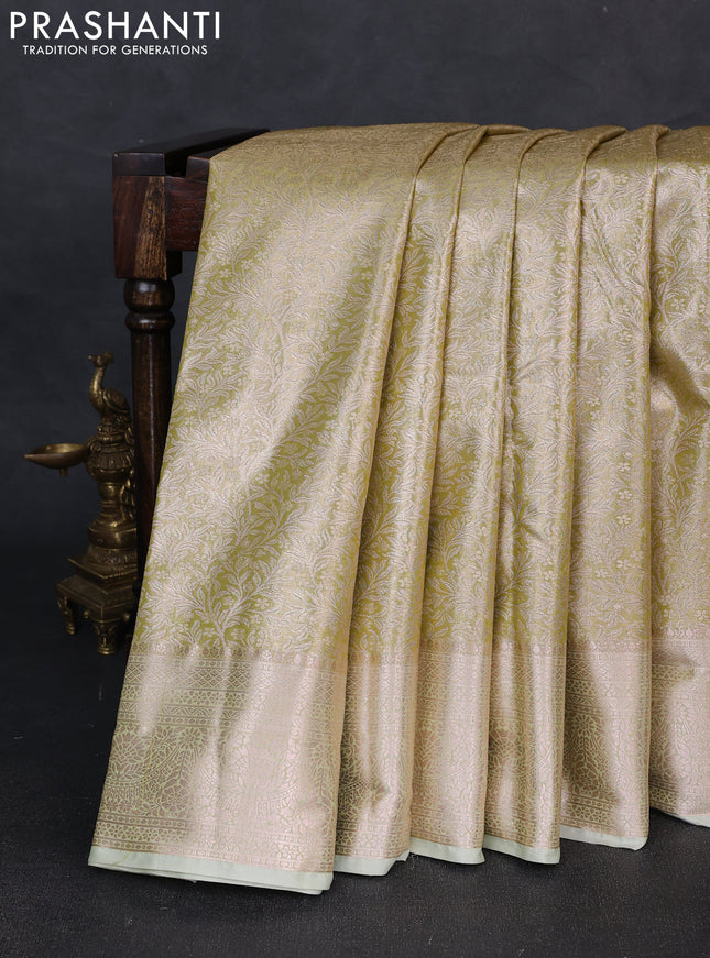 Bangalori tissue silk saree pista green with allover zari woven brocade weaves and zari woven border