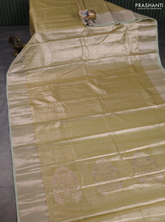 Bangalori tissue silk saree pista green with allover zari woven brocade weaves and zari woven border