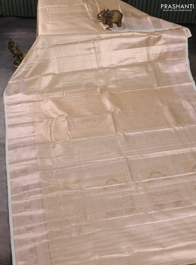 Bangalori tissue silk saree cream with allover zari woven brocade weaves and zari woven border