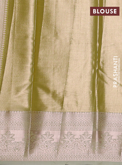Bangalori tissue silk saree pista green with allover zari woven brocade weaves and zari woven border