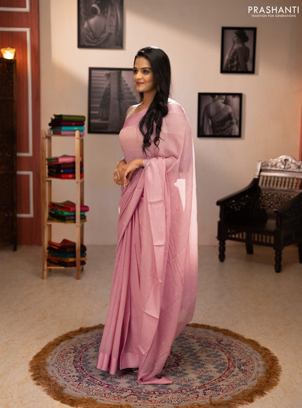 Pure chiffon silk saree peach shade with golden buttas and floral printed blouse