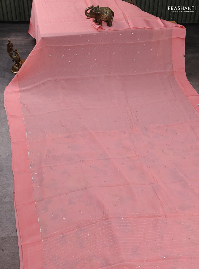 Pure chiffon silk saree peach shade with golden buttas and floral printed blouse