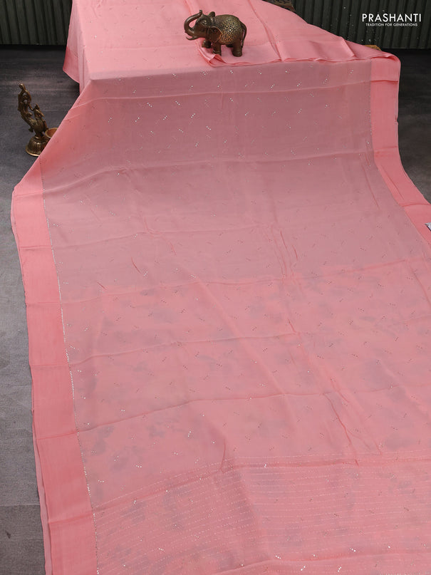 Pure chiffon silk saree peach shade with golden buttas and floral printed blouse