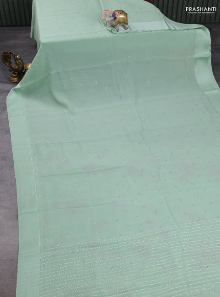 Pure chiffon silk saree pista green with golden buttas and floral printed blouse