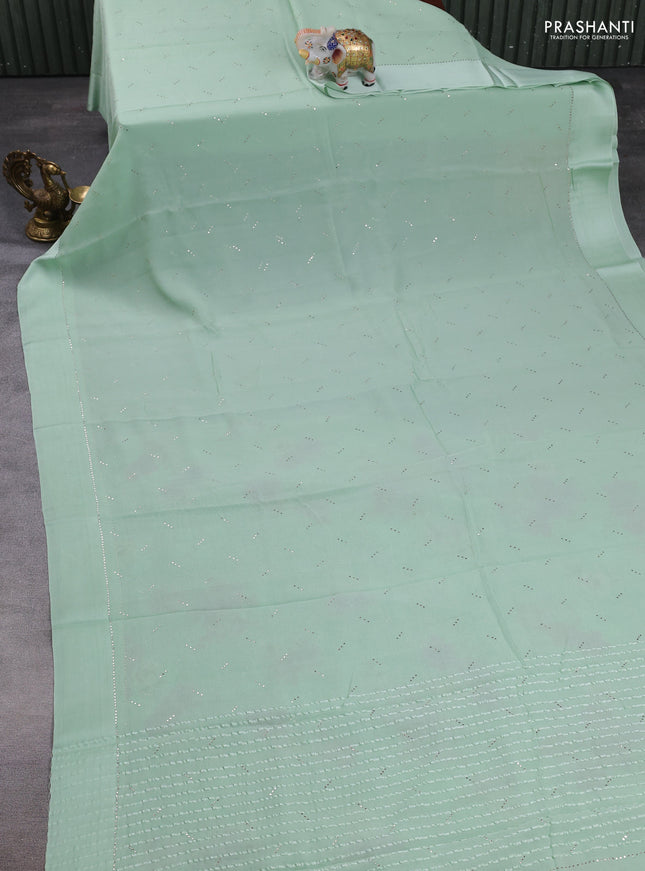 Pure chiffon silk saree pista green with golden buttas and floral printed blouse