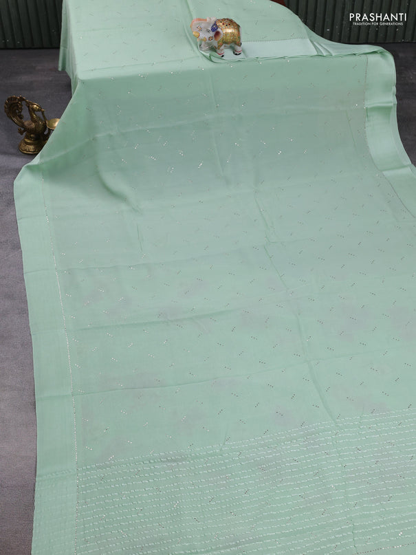 Pure chiffon silk saree pista green with golden buttas and floral printed blouse