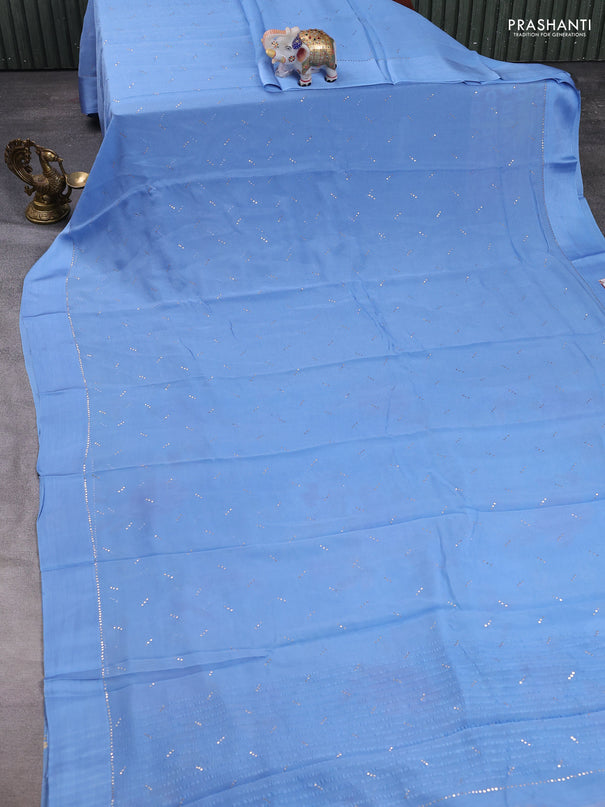 Pure chiffon silk saree pastel blue with golden buttas and floral printed blouse