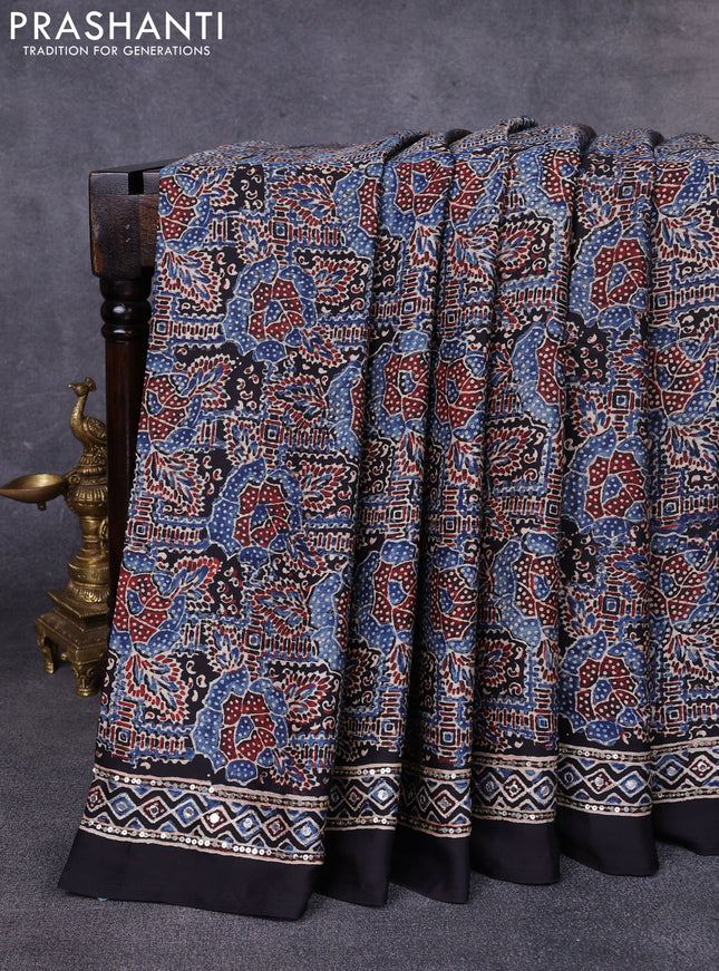 Modal silk saree black with allover ajrakh prints & sequin work and mirror sequin work pallu