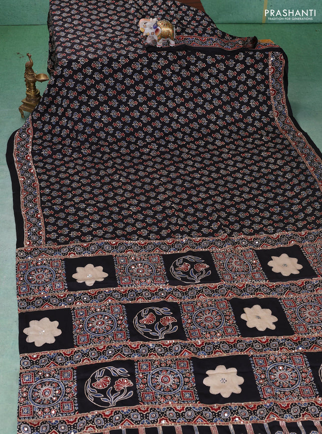 Modal silk saree black with allover ajrakh prints & sequin work and mirror sequin work pallu