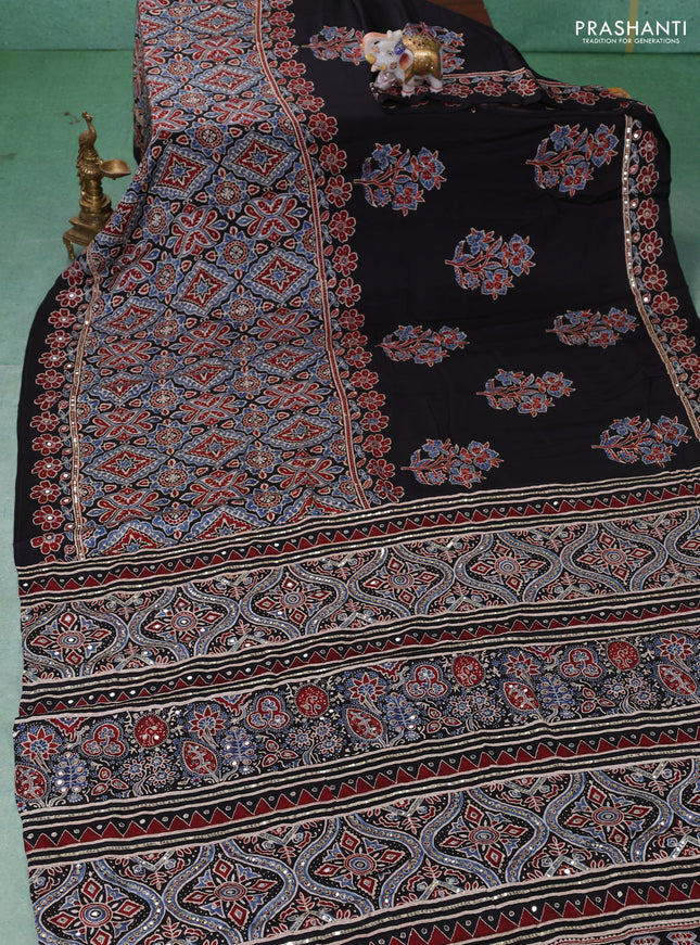 Modal silk saree black with allover ajrakh prints & sequin work and mirror sequin work pallu