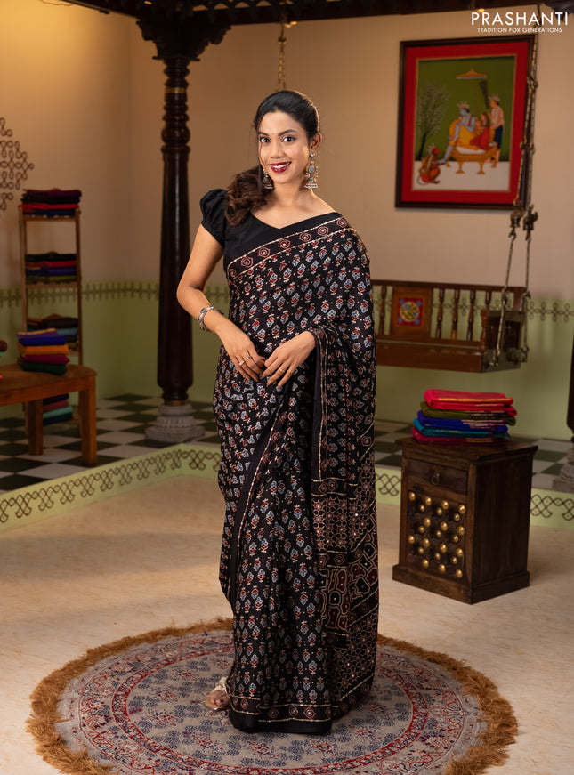 Modal silk saree black with allover ajrakh prints & sequin work and mirror sequin work pallu