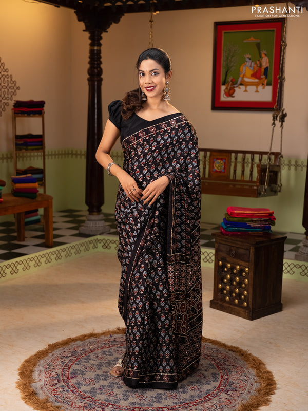 Modal silk saree black with allover ajrakh prints & sequin work and mirror sequin work pallu