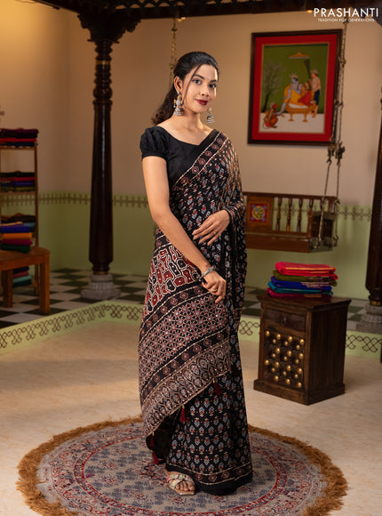 Modal silk saree black with allover ajrakh prints & sequin work and mirror sequin work pallu