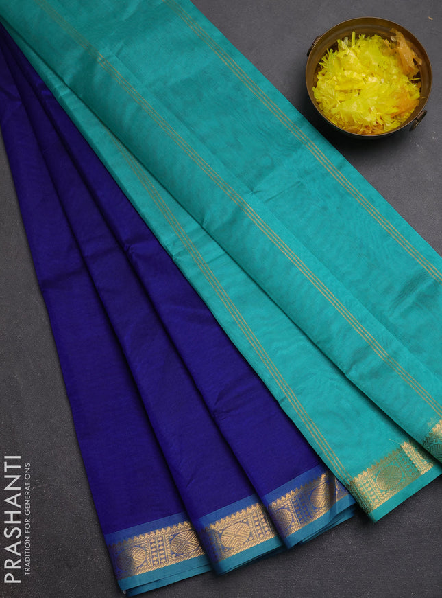Silk cotton saree royal blue and teal green with plain body and rudraksha butta border