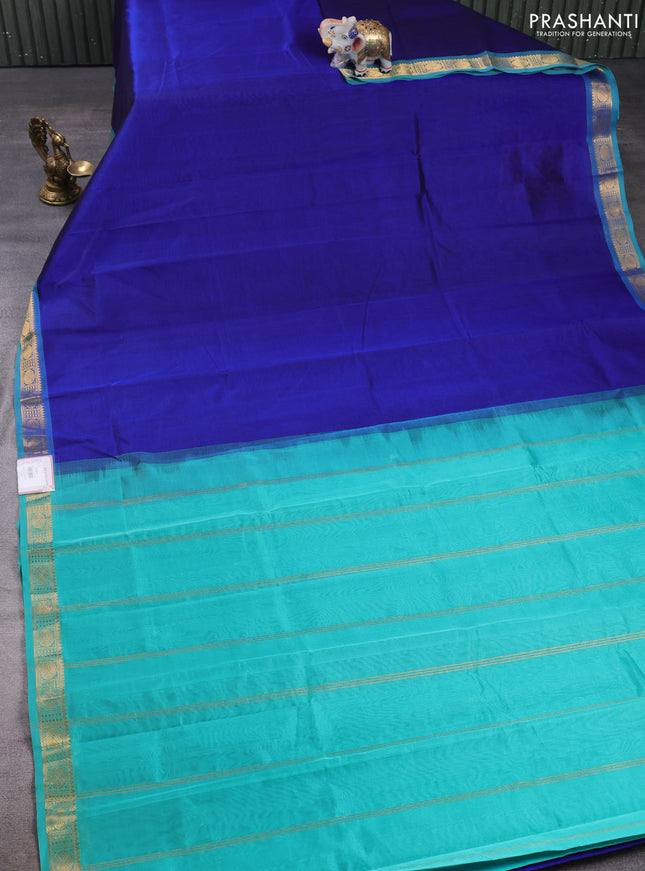 Silk cotton saree royal blue and teal green with plain body and rudraksha butta border