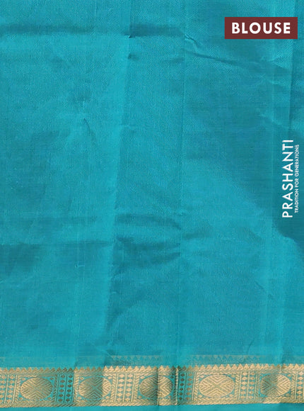 Silk cotton saree royal blue and teal green with plain body and rudraksha butta border