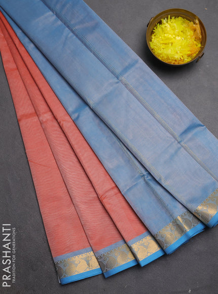 Silk cotton saree rust shade and grey with plain body and paisley zari woven border