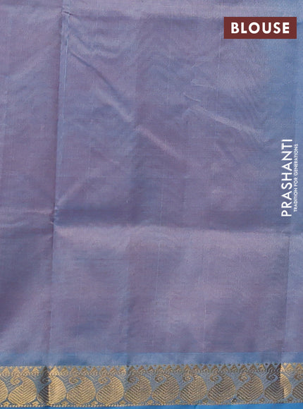 Silk cotton saree rust shade and grey with plain body and paisley zari woven border