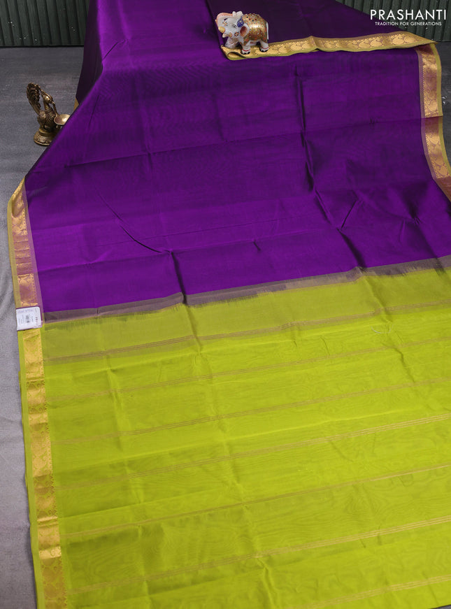 Silk cotton saree purple and light green with plain body and paisley zari woven border