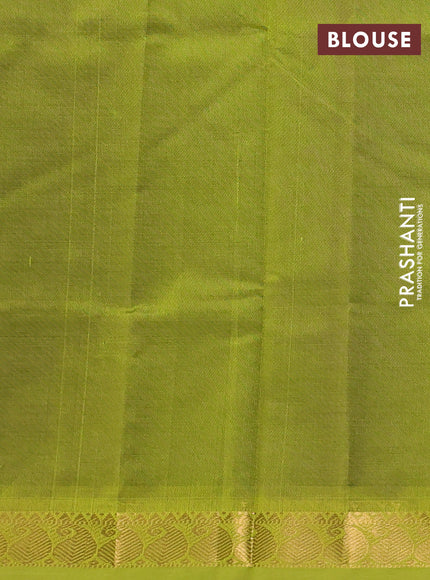 Silk cotton saree purple and light green with plain body and paisley zari woven border