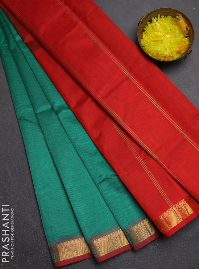 Silk cotton saree teal green and red with plain body and temple zari woven border