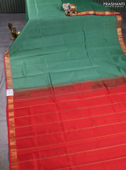 Silk cotton saree green and red with plain body and temple zari woven border