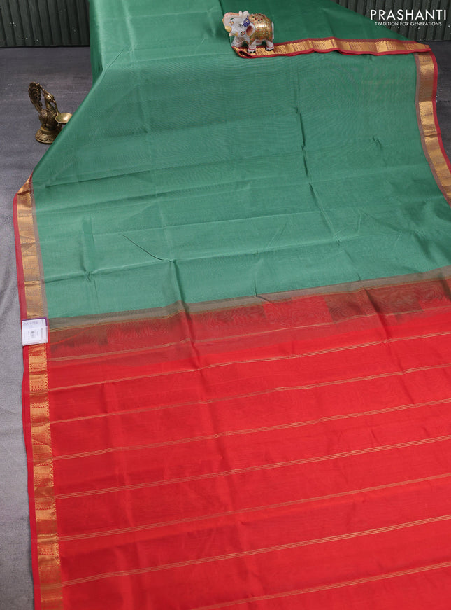Silk cotton saree green and red with plain body and temple zari woven border