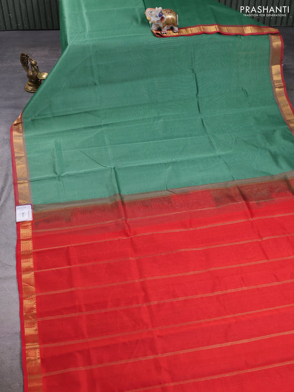 Silk cotton saree green and red with plain body and temple zari woven border