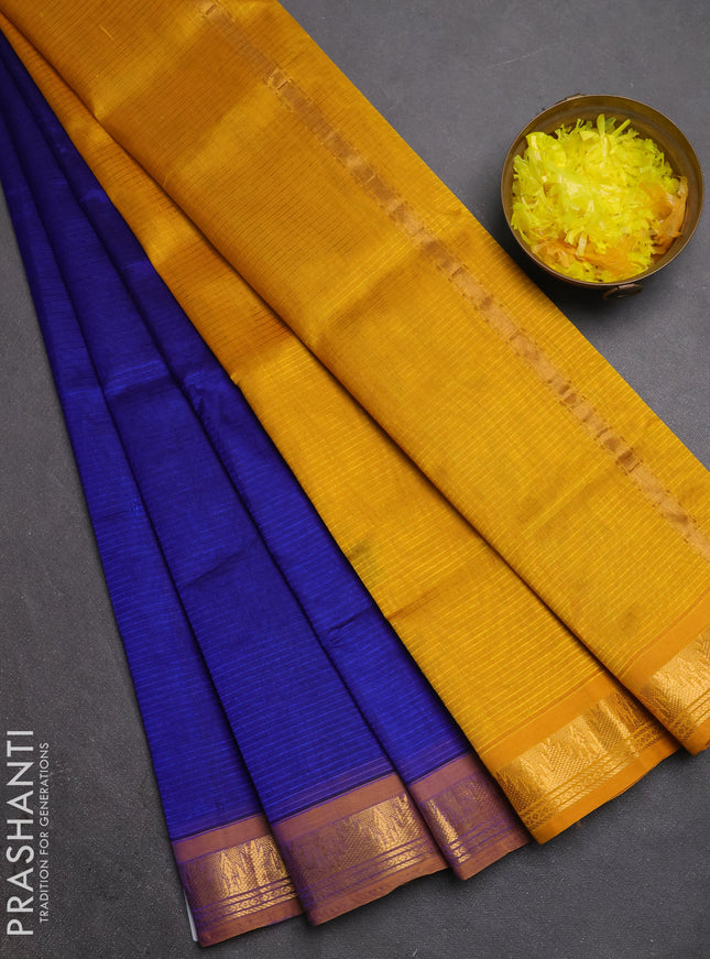 Silk cotton saree royal blue and mustard yellow with plain body and temple zari woven border