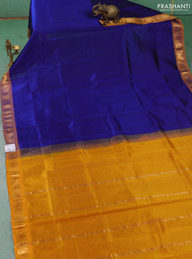Silk cotton saree royal blue and mustard yellow with plain body and temple zari woven border