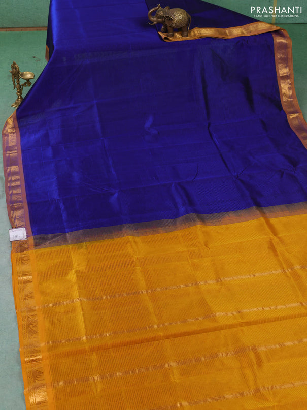 Silk cotton saree royal blue and mustard yellow with plain body and temple zari woven border