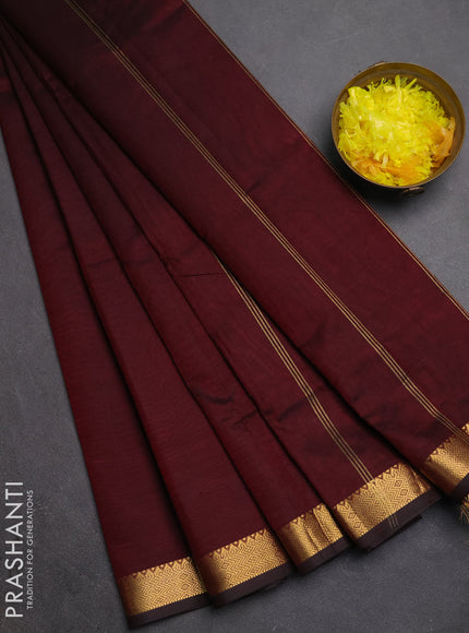 Silk cotton saree deep wine with plain body and zari woven border