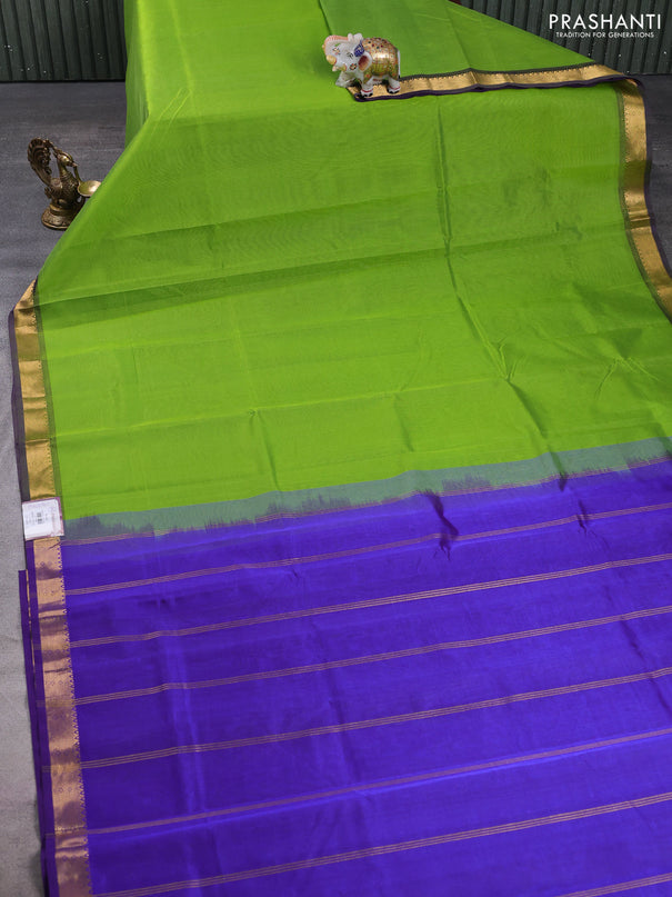 Silk cotton saree light green and violet with plain body and zari woven border