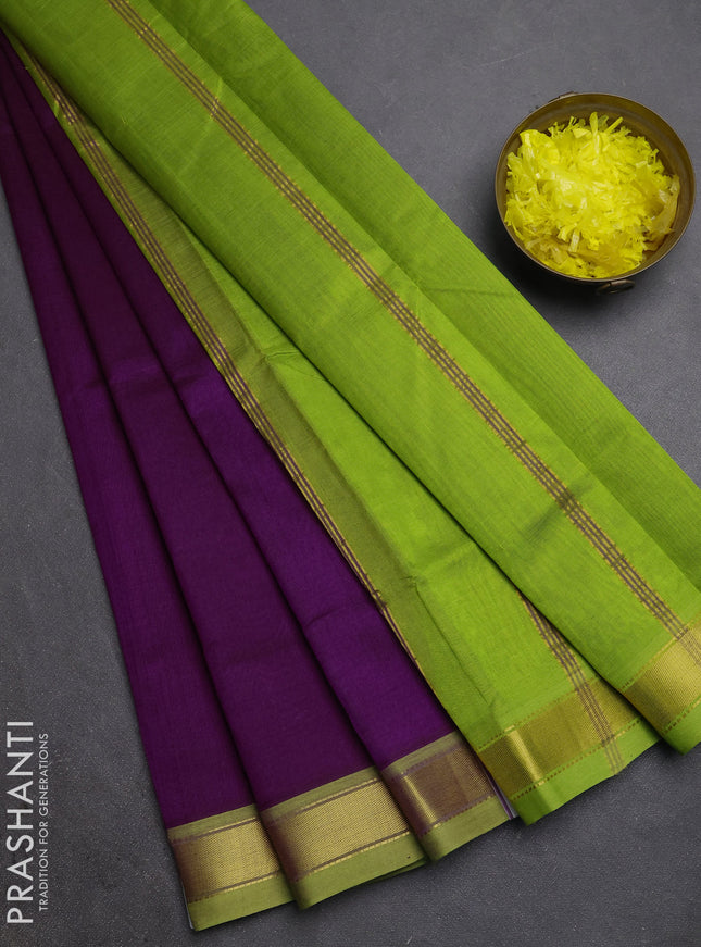 Silk cotton saree purple and light green with plain body and zari woven border