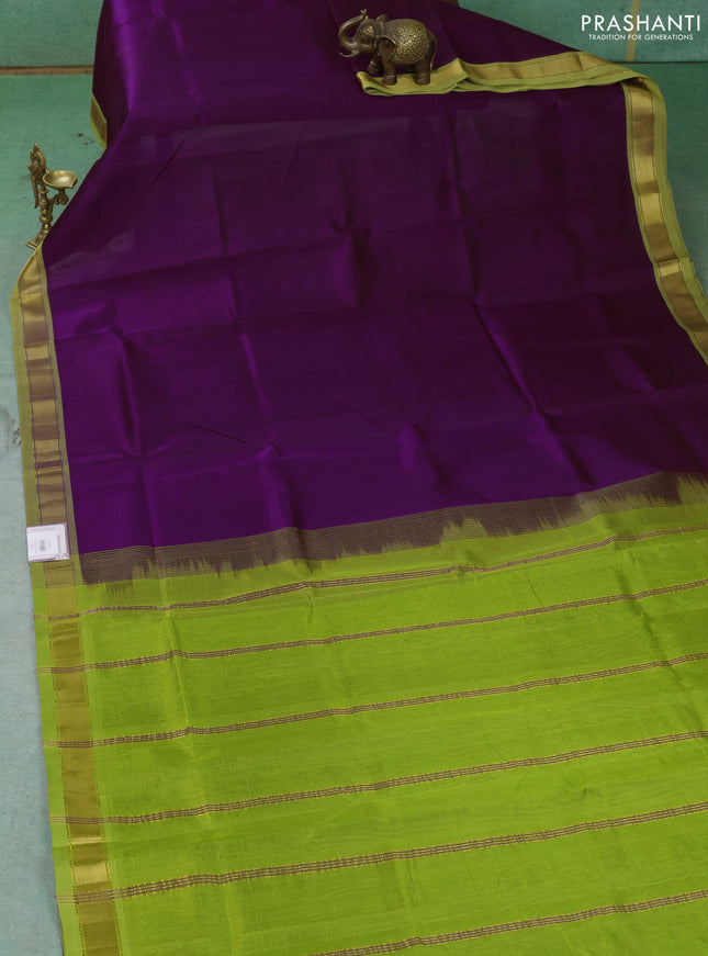 Silk cotton saree purple and light green with plain body and zari woven border