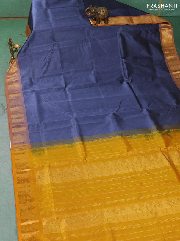 Silk cotton saree dark grey and mustard yellow with plain body and temple zari woven border