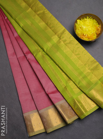 Silk cotton saree maroon and light green with plain body and temple zari woven border