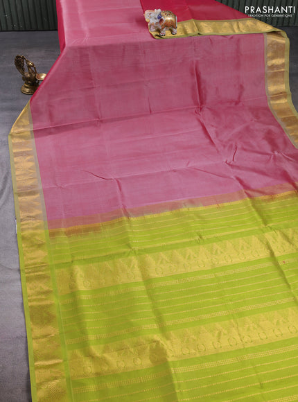 Silk cotton saree maroon and light green with plain body and temple zari woven border